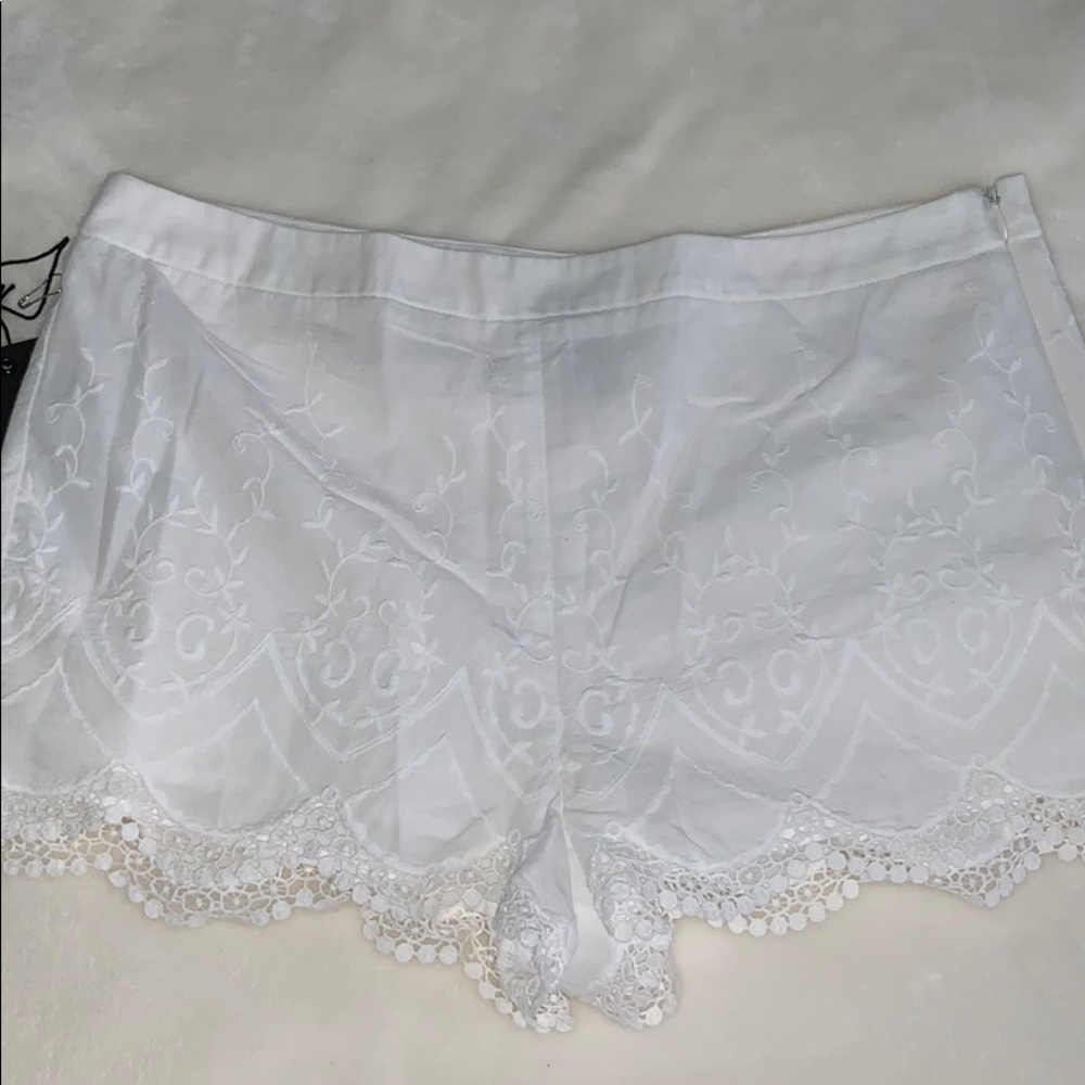 white embroidered shorts